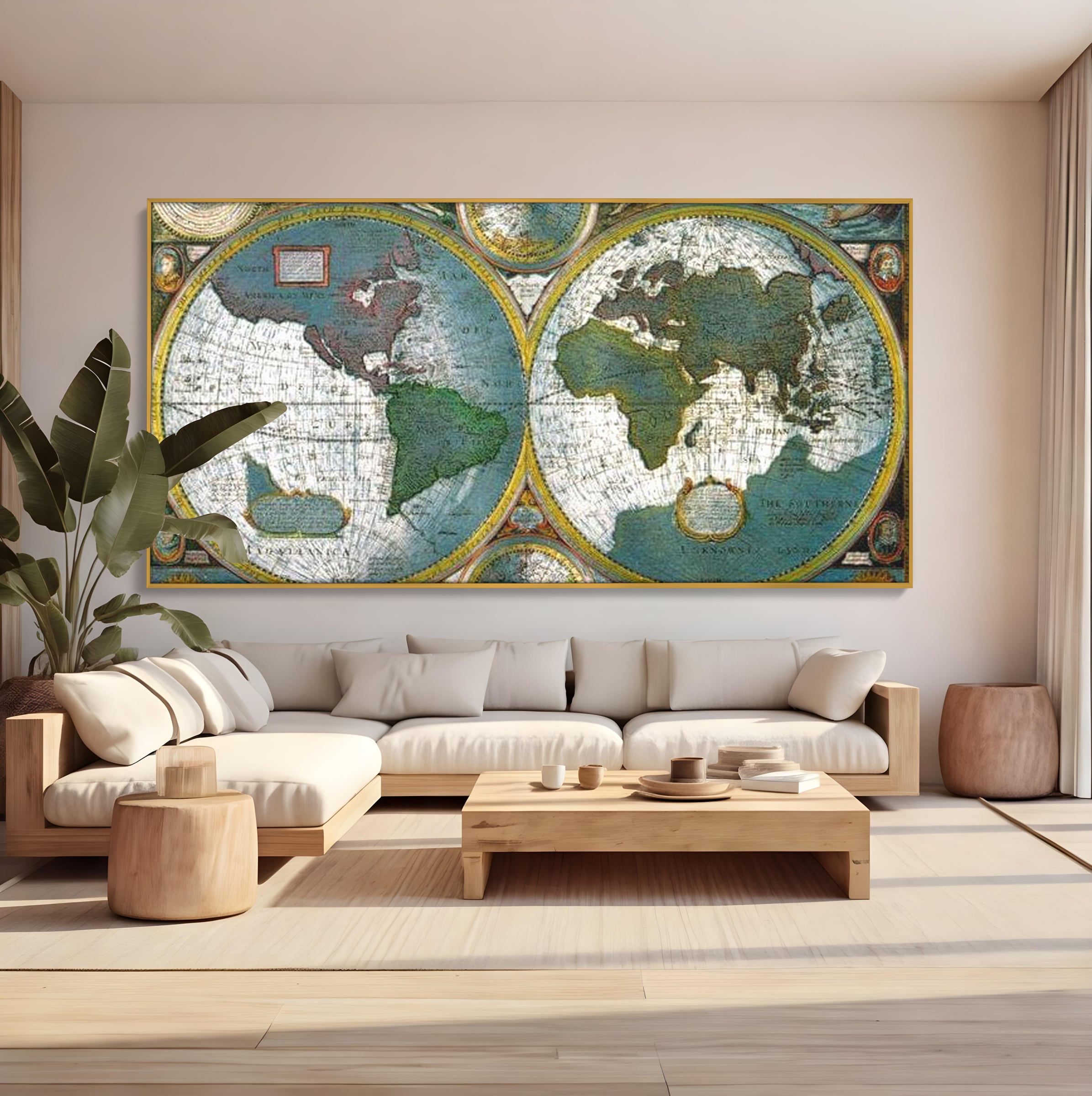 Tablou canvas cu harta veche a lumii cu doua emisfere, in rama de aluminiu auriu, pe perete intr-un living